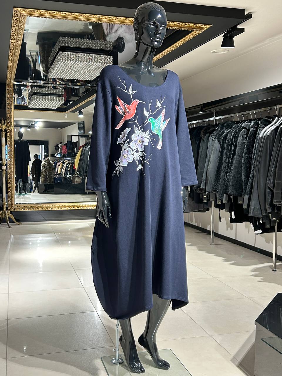 Boho-style navy dress with floral branch and hummingbird print