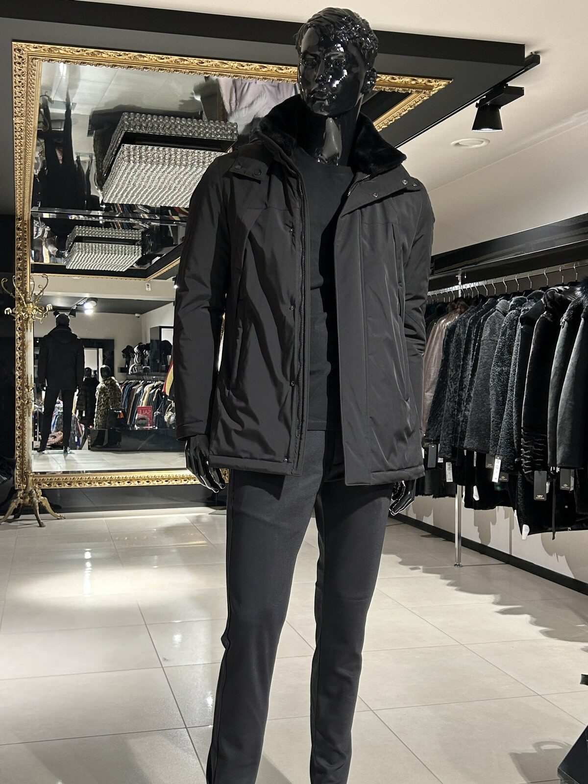 Black hooded down jacket with faux fur collar